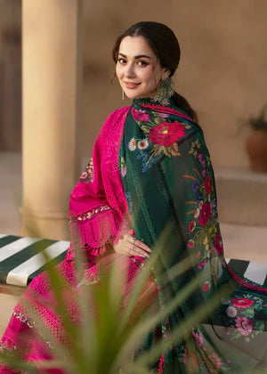 Woman wearing a traditional outfit with floral patterns in a warm-toned setting