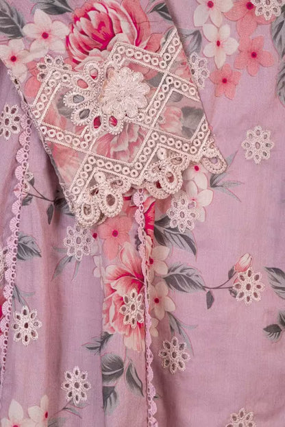 Decorative fabric with lace and floral patterns on a pink background