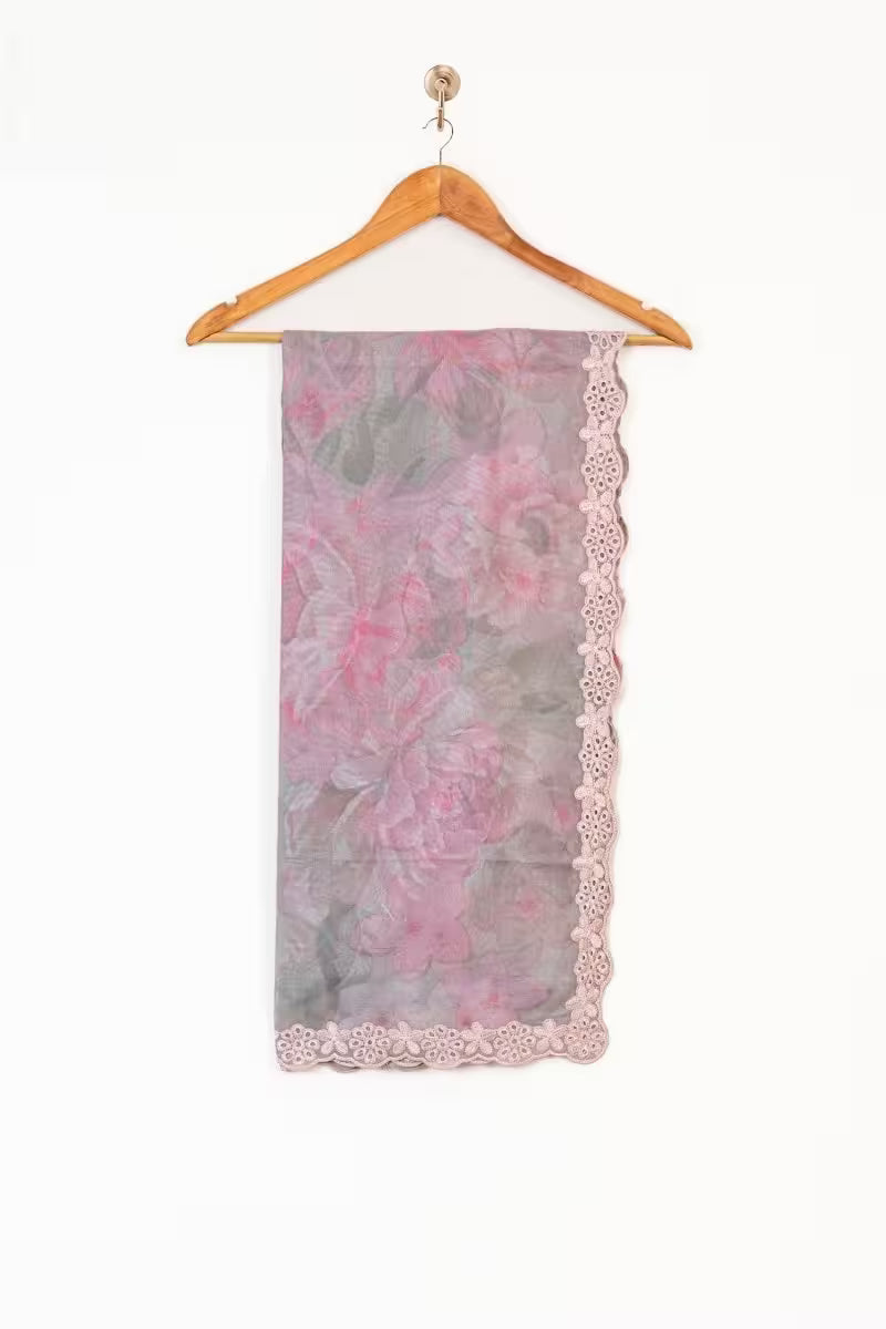 Floral patterned scarf on a wooden hanger against a white background